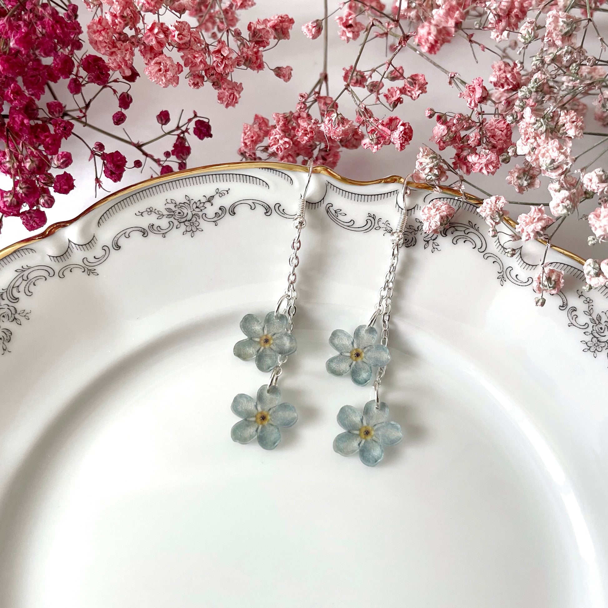 Lemmikki-korvakorut kahdella kukalla