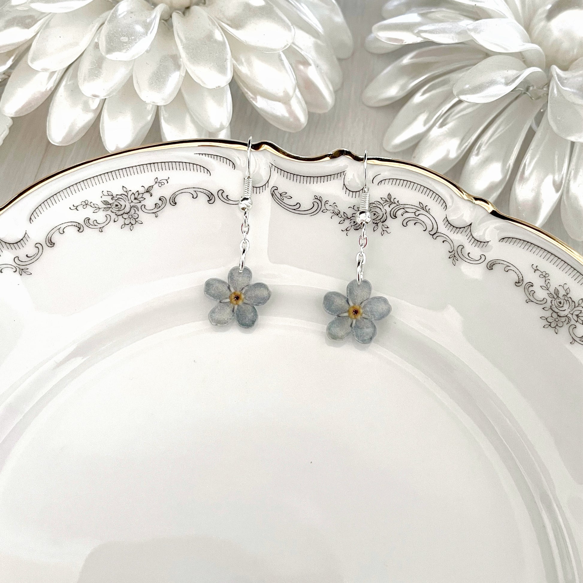 Lemmikki-korvakorut yhdellä kukalla