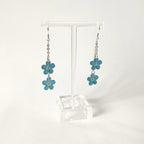 Lemmikki-korvakorut kahdella kukalla