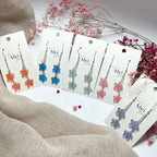 Lemmikki-korvakorut kahdella kukalla