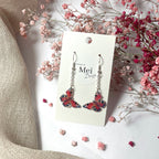 Neitoperhonen-korvakorut