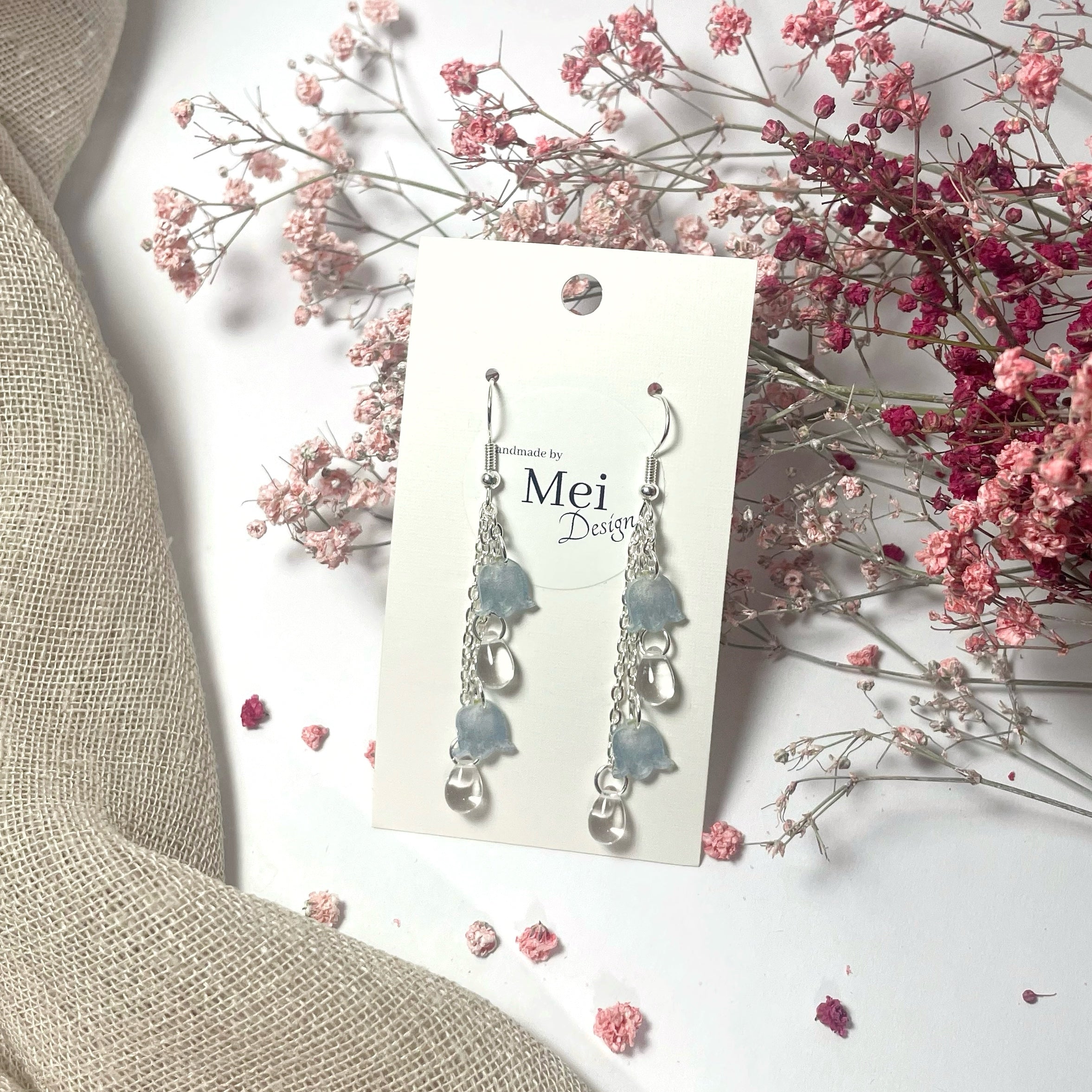 Kielo-korvakorut helmillä