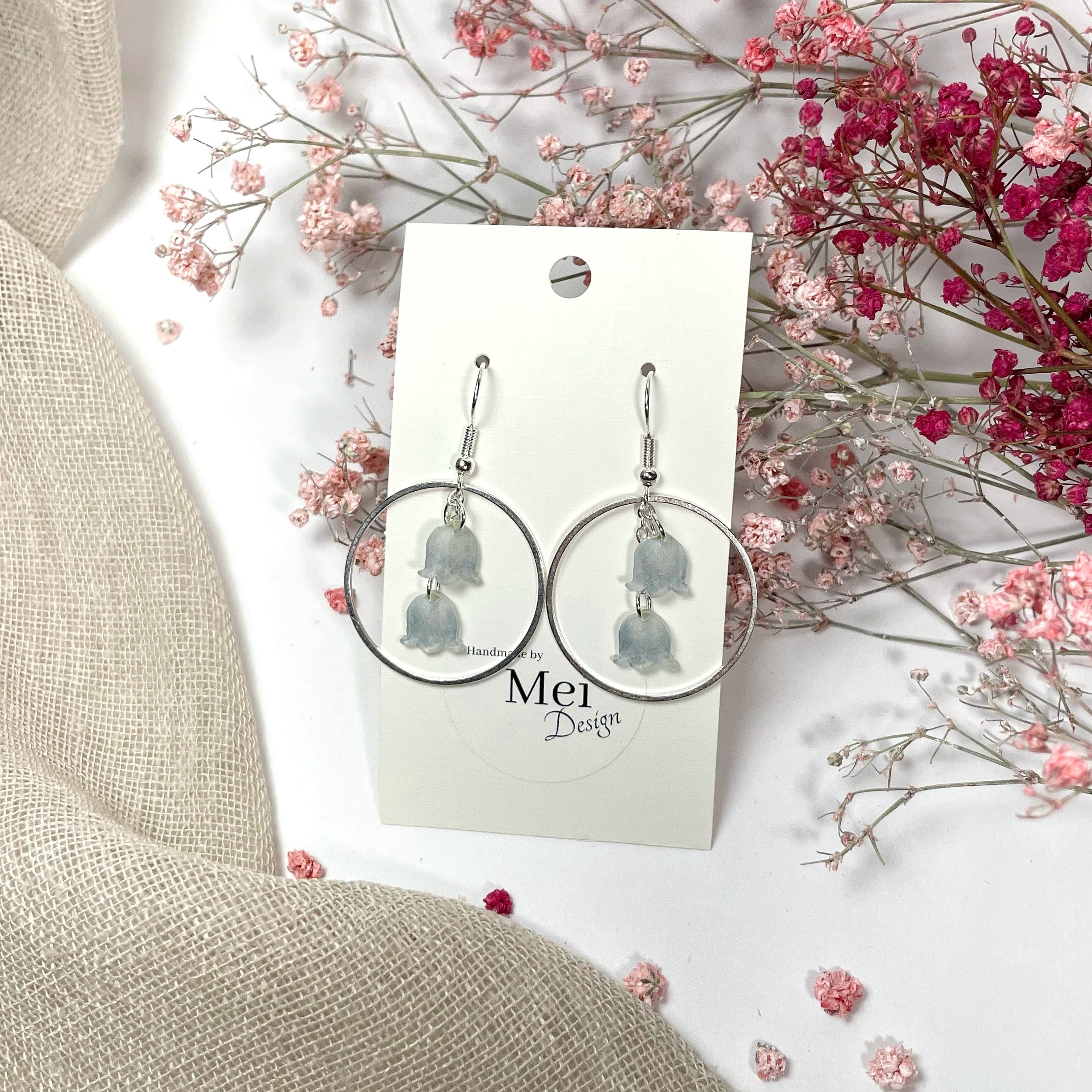 Kielo-korvakorut renkailla