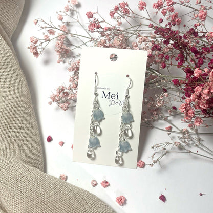 Kielo-korvakorut helmillä