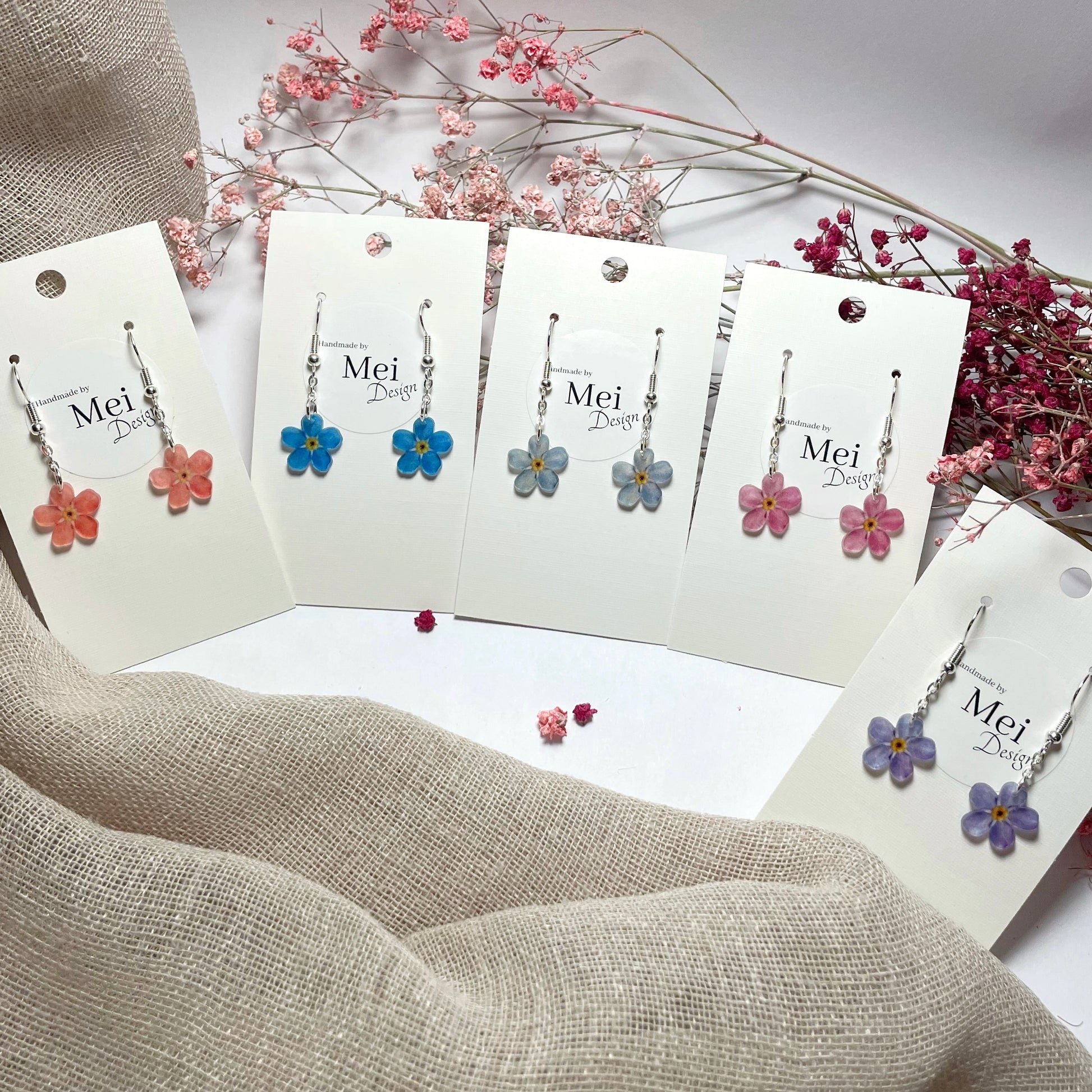 Lemmikki-korvakorut yhdellä kukalla