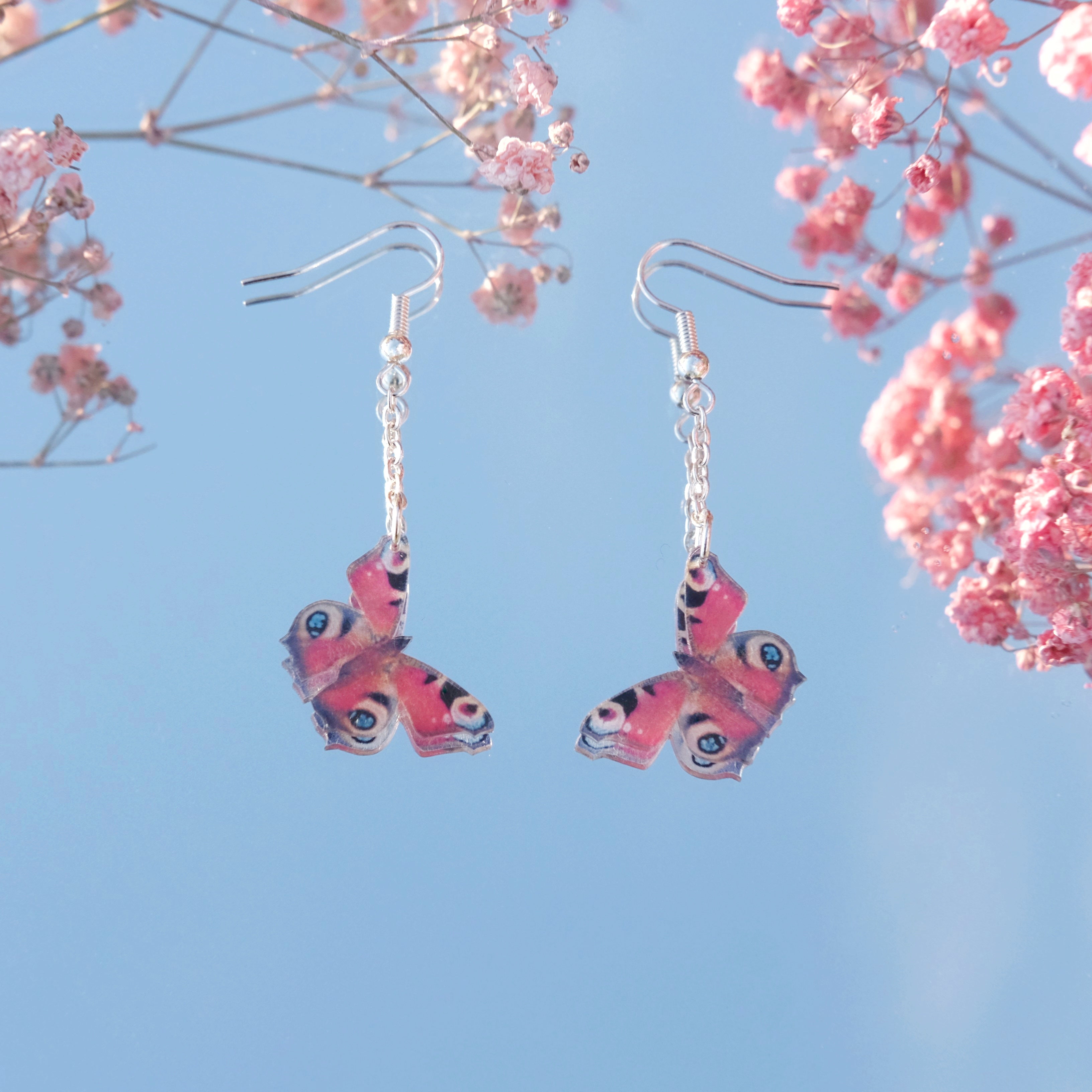 Neitoperhonen-korvakorut